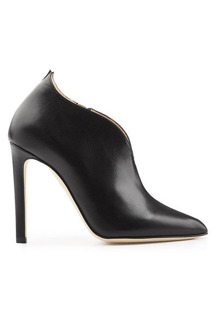 In smooth black leather with a refined pointed toe, these stiletto heel ankle boots from Chloe Gosselin are a chic choice with a gold-tone zipper. Versatile and easy to take from season to season, they work as flawlessly with tailored pants as they do with slim denim. In Black To buy click to link.