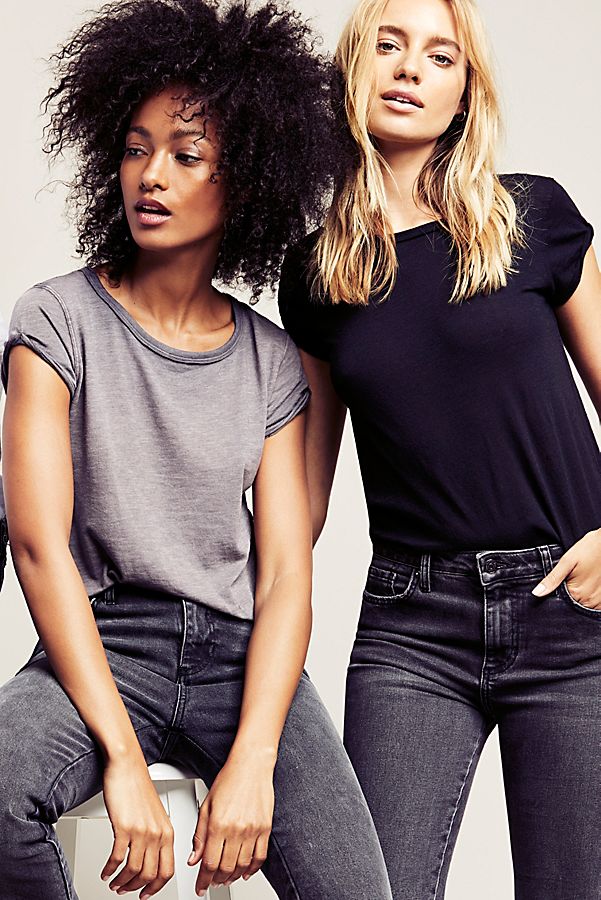 Two women wearing tee shirts